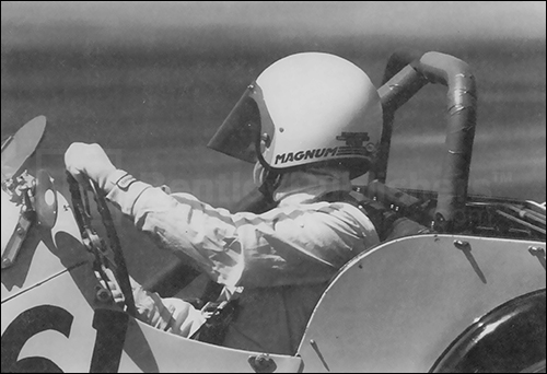 This Morgan Driver is well prepared for the turn: hands positioned correctly on wheel, and looking ahead past the turn to see where he wants to go next.