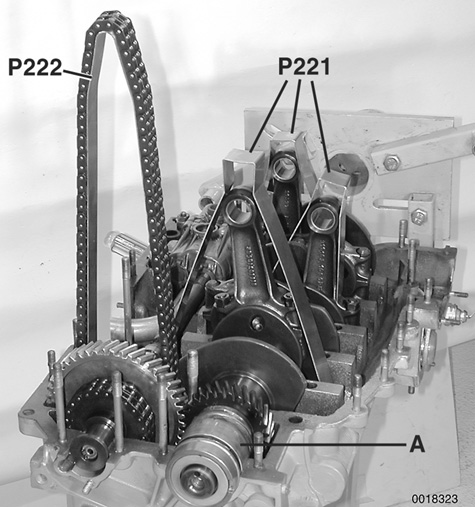 Detailed photographs for each repair procedure, including illustrations of Porsche special tools. Shown are the connecting rod and timing chain supports that make crankcase assembly a lot easier.
102 Engine Disassembly and Assembly
page 102-21